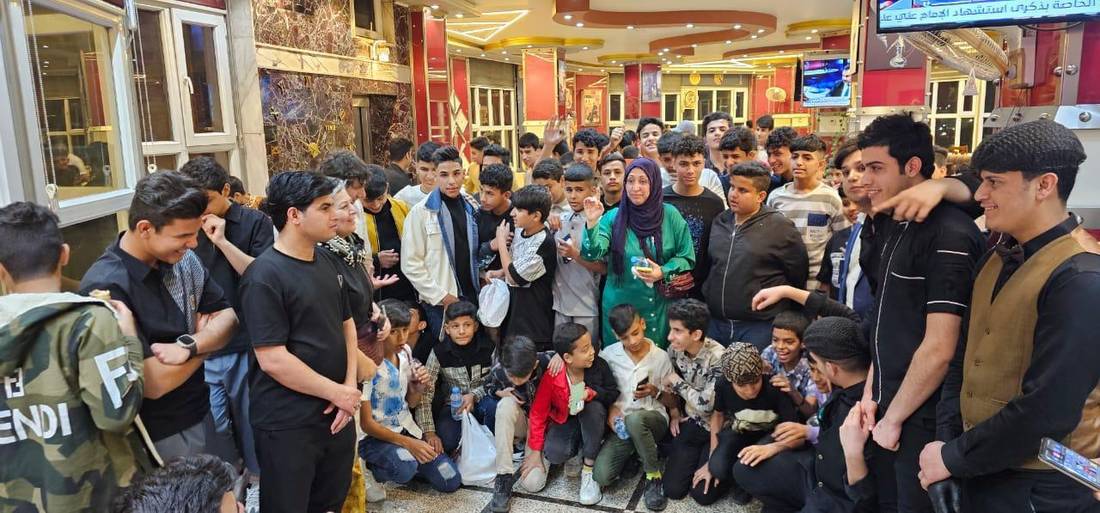 Hundreds of orphaned boys gathered in a restaurant for an iftar meal